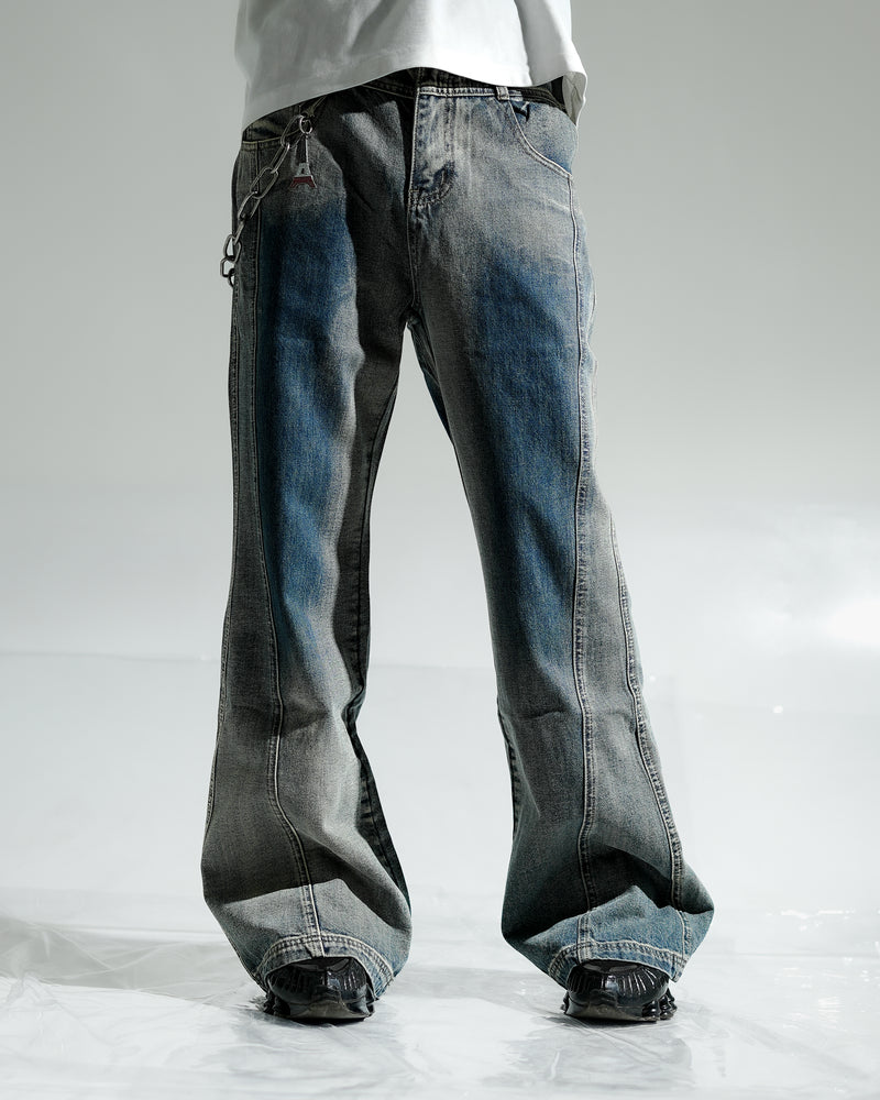 Distressed blue jeans on a white background